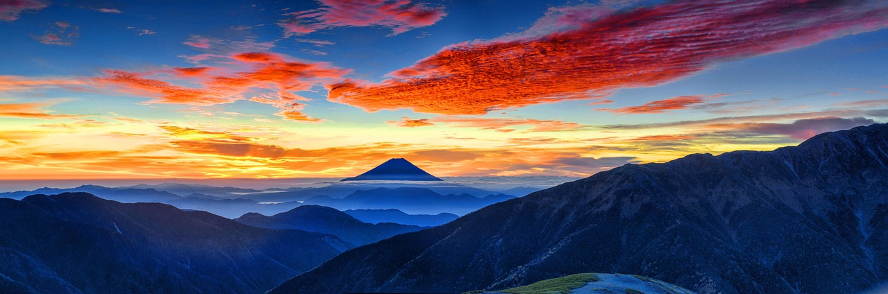 Japanese culture: Shinkansen bullet train passing Mount Fuji in Japan